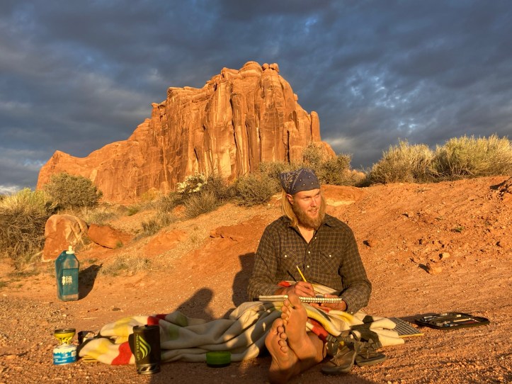 Ian, drawing the sunrise in Arches National Park.
